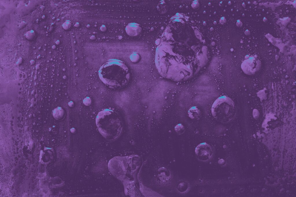 Purple table with water droplets