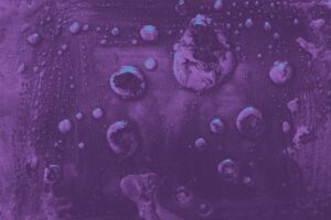 Purple table with water droplets